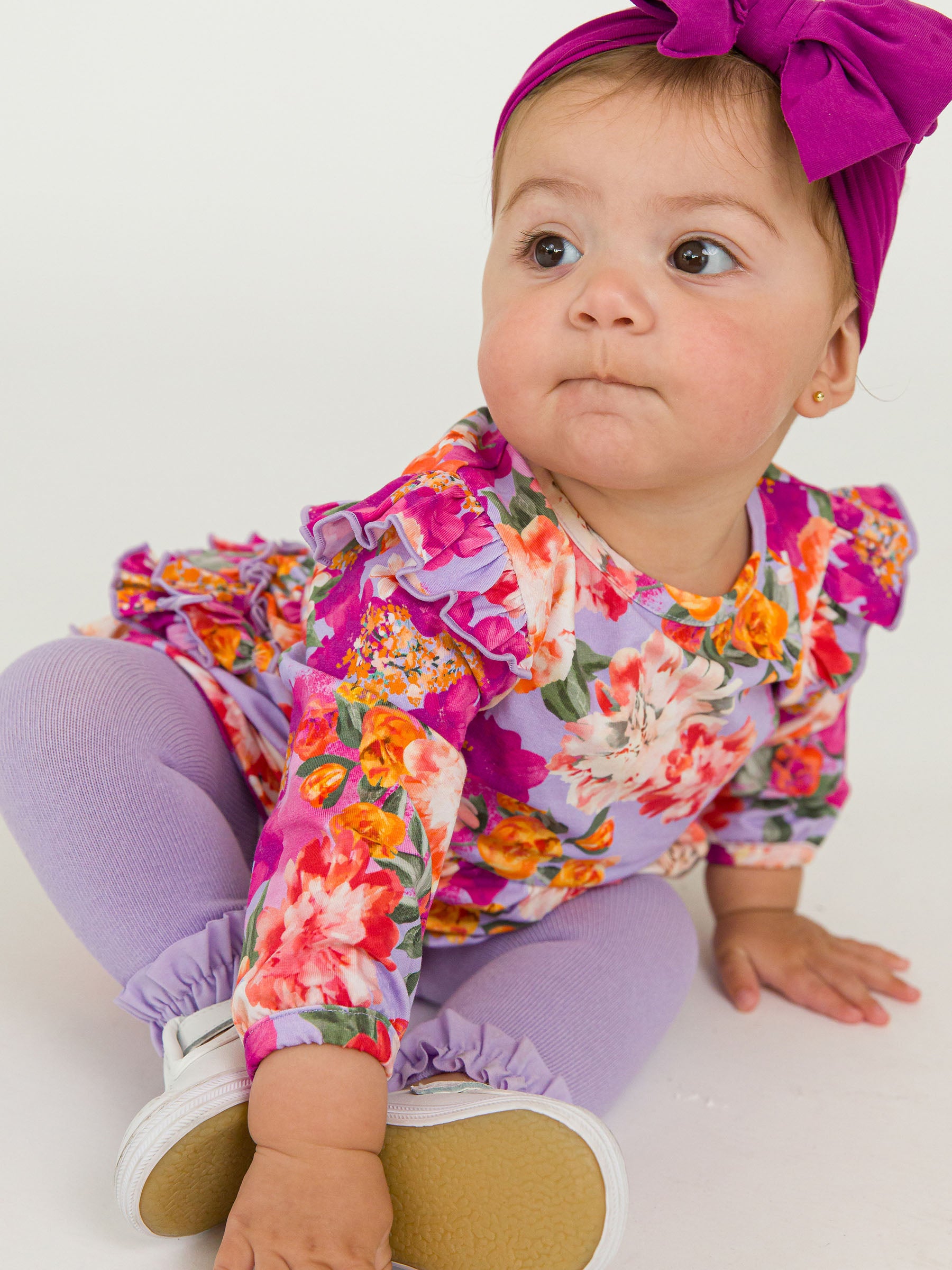 baby girl orange and purple floral bubble romper with flutter sleeve