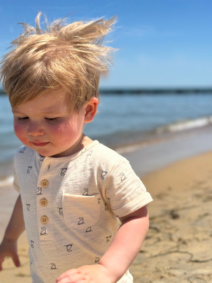 cream dog print romper beach