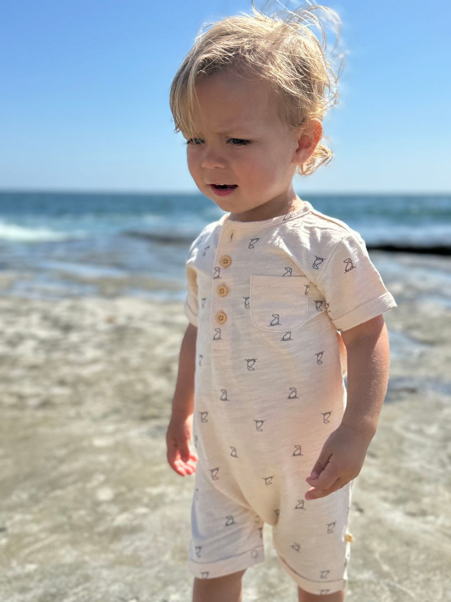 cream dog print romper