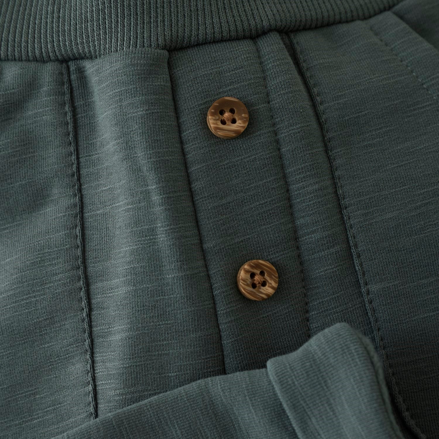 forest green elastic waist baby joggers with faux buttons