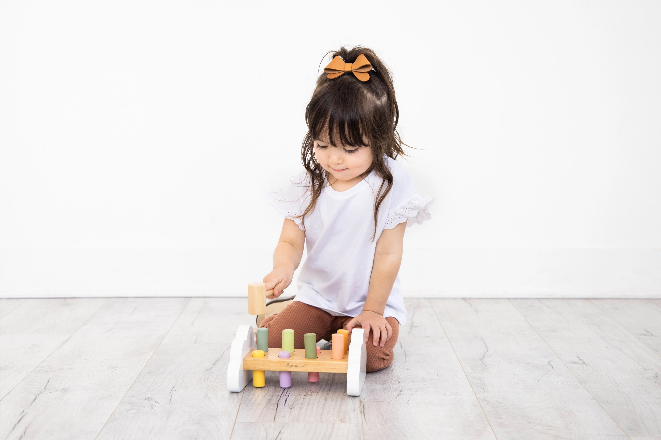 Another Kid Playing with Wooden Hammer Bench Toy