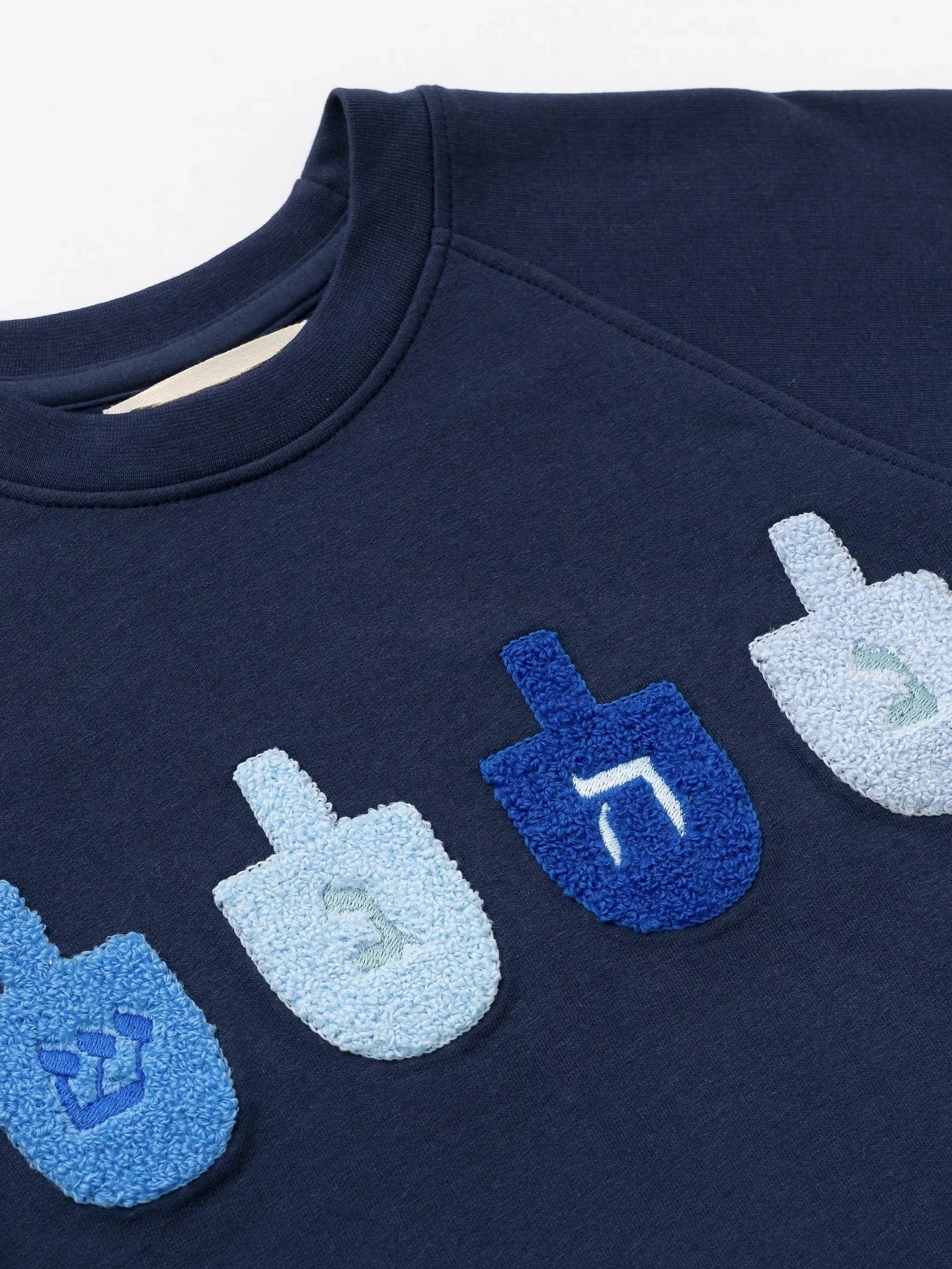 Hanukkah sweatshirt with dreidels for toddlers