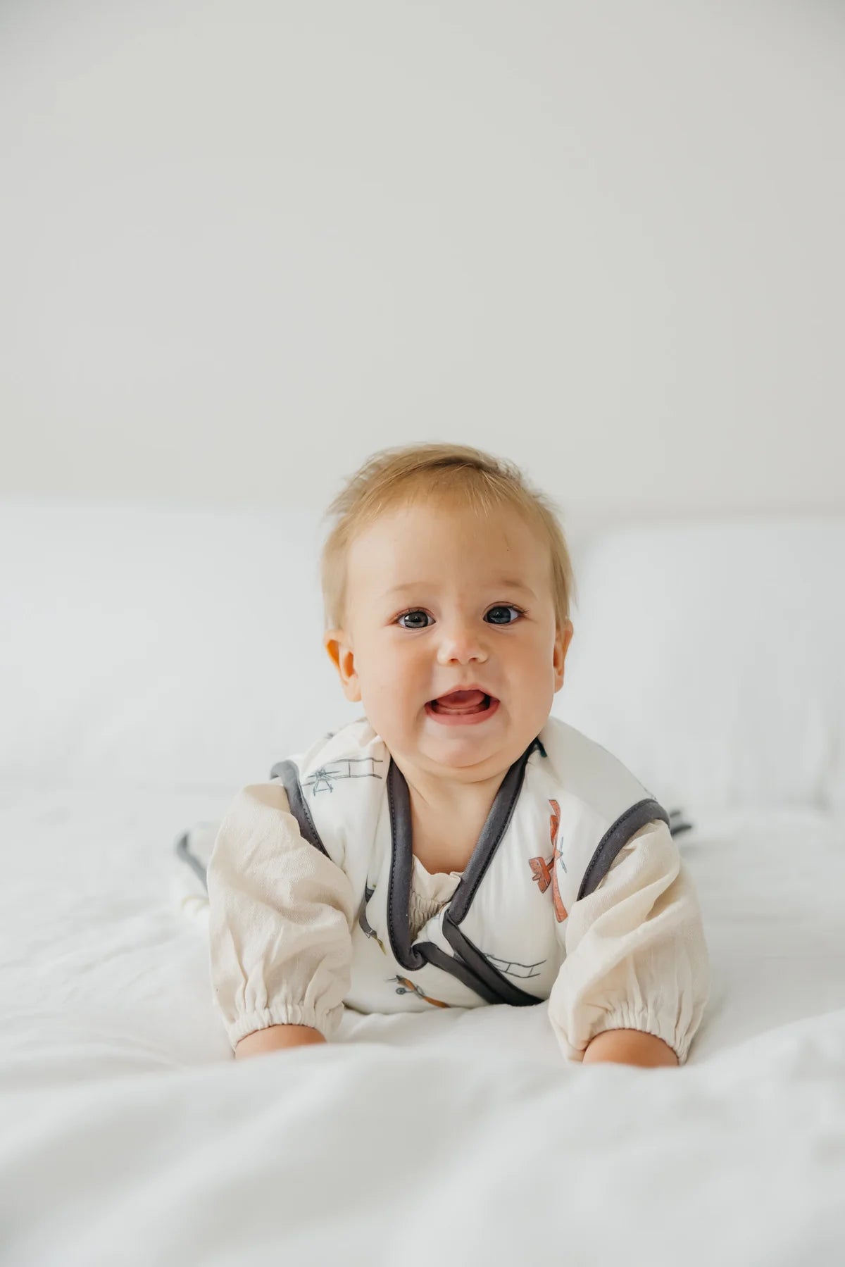 Baby in an airplane sleep sac