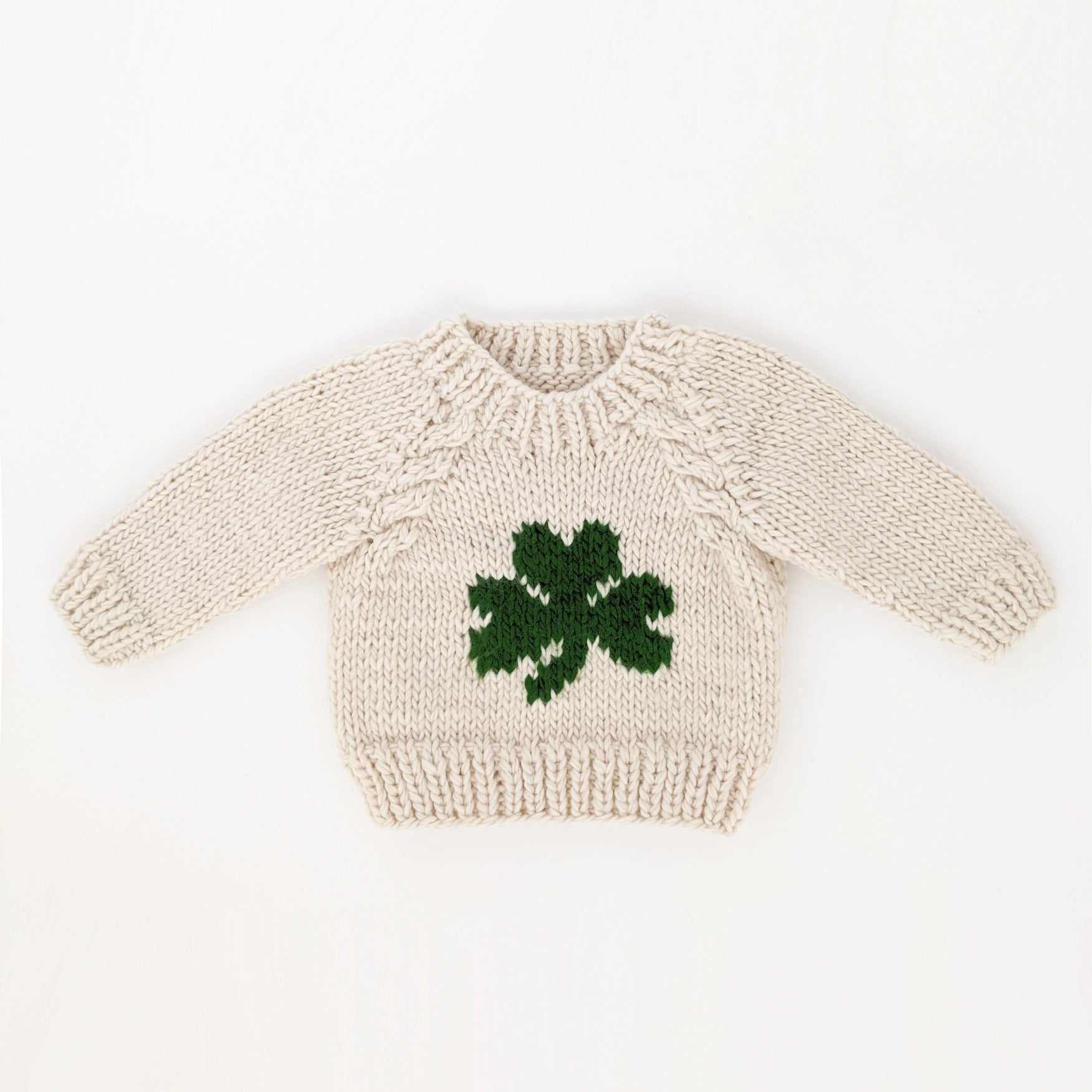 green clover knit baby sweater