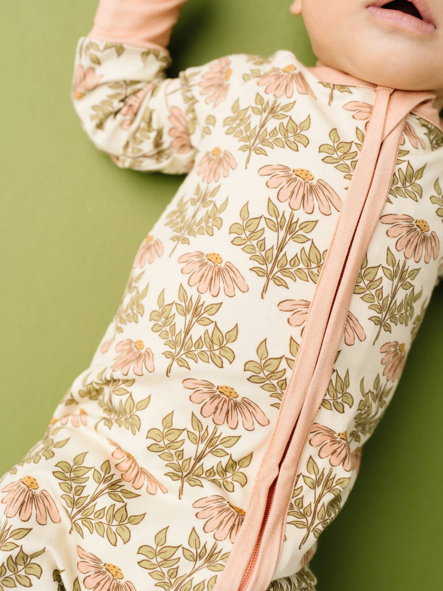 pink daisy convertible footie detail