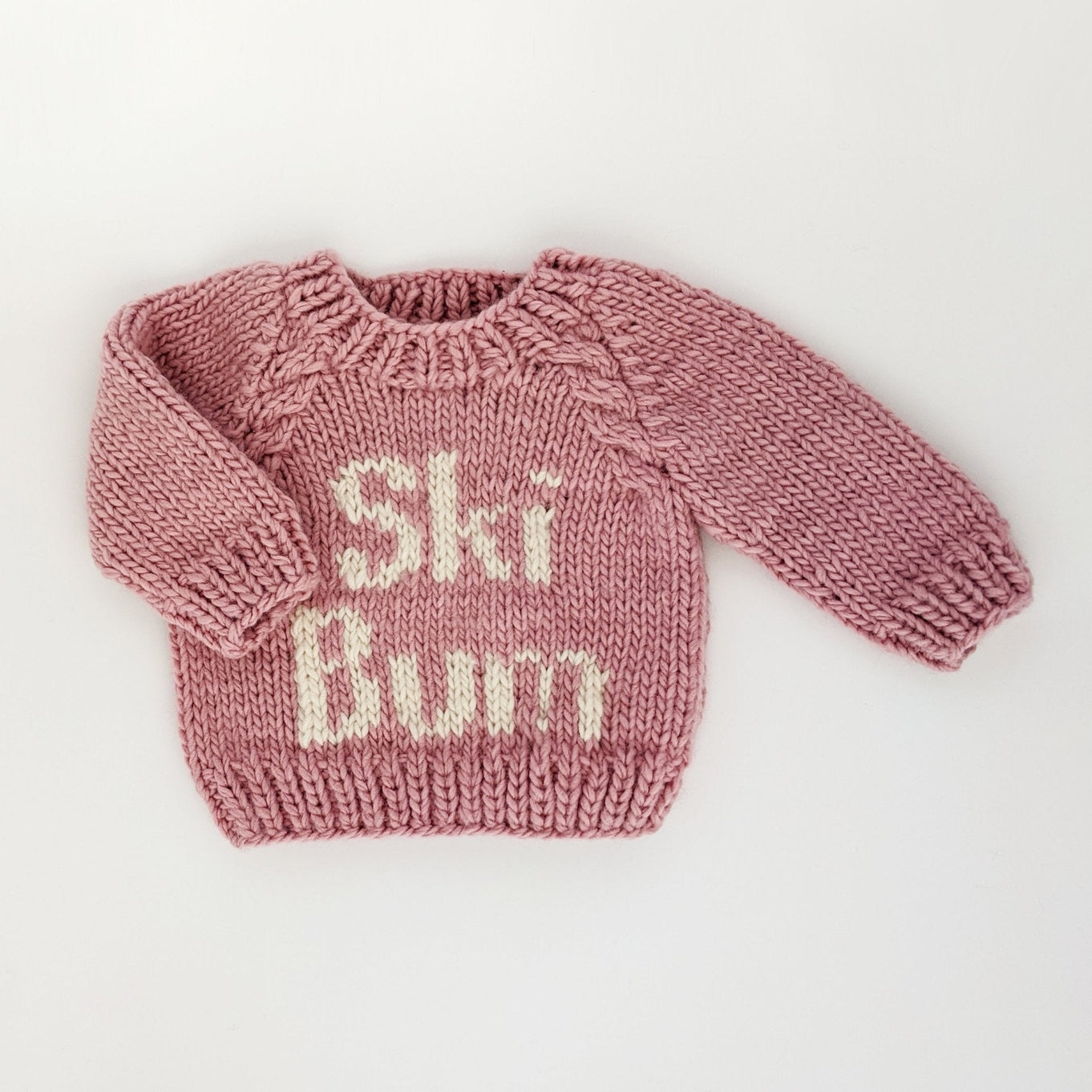 pink ski bum sweater