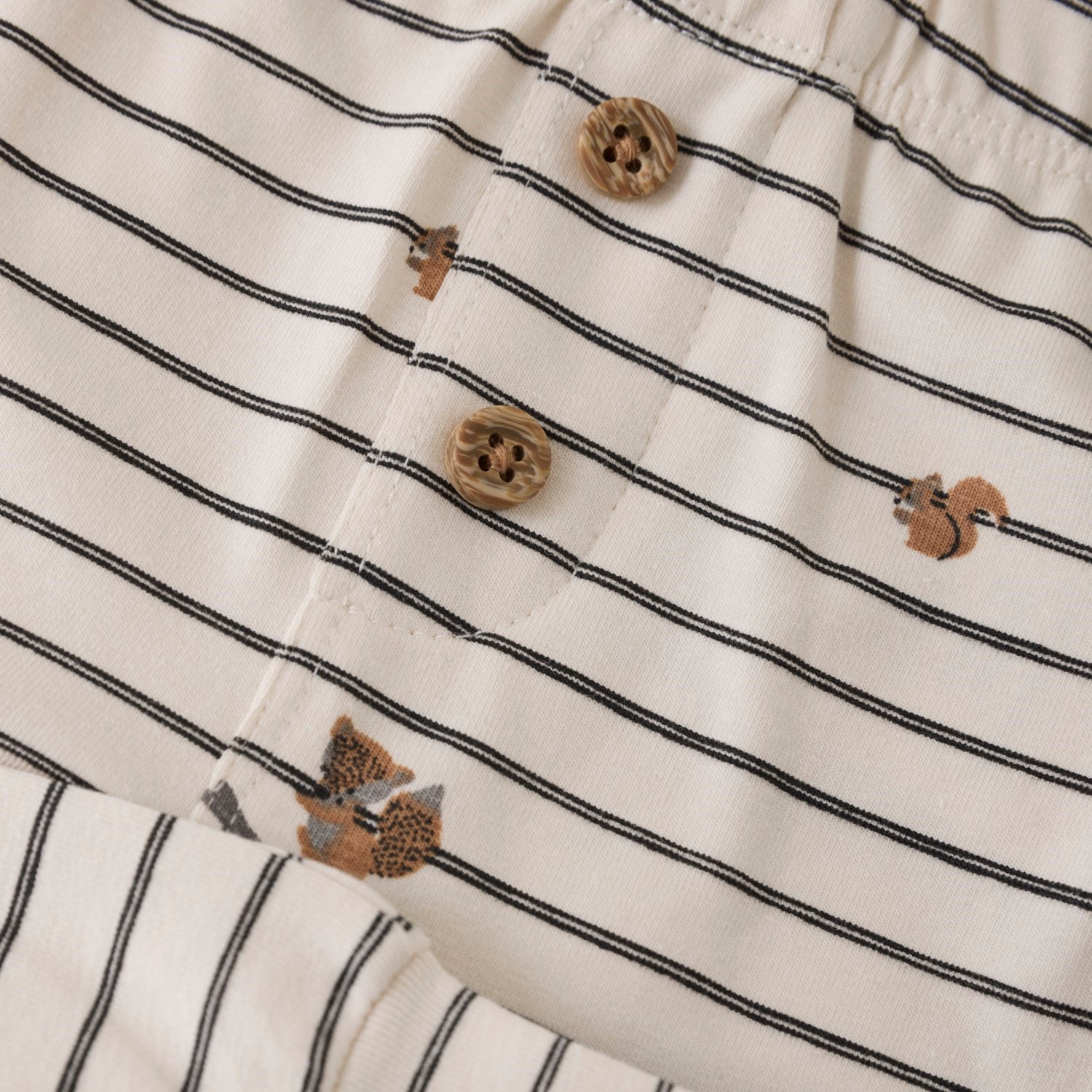 woodland creature baby jogger with faux buttons